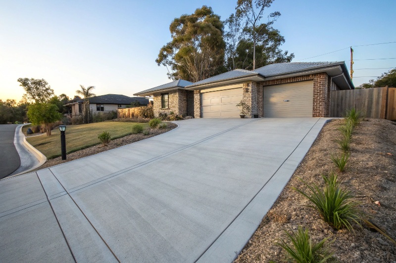 Professional residential concrete driveway installation in Maryborough Queensland suburban home